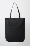 front view of the dawn oversized tote in black Horween essex veg tan leather