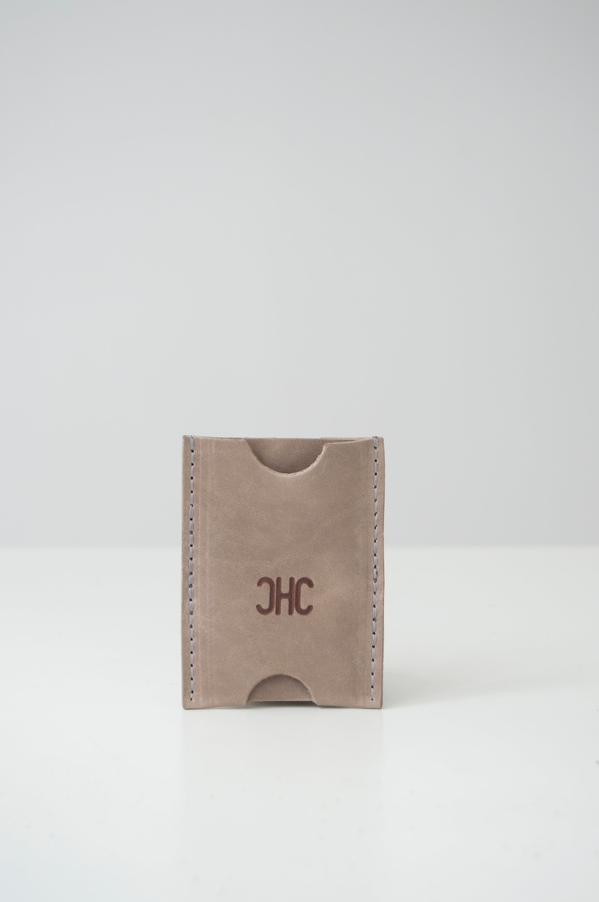 front view of the dusk wallet in taupe leather