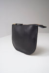 front view of the dawn pouch in black Horween essex veg tan leather