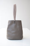 front view of the small aura in taupe pebbled leather